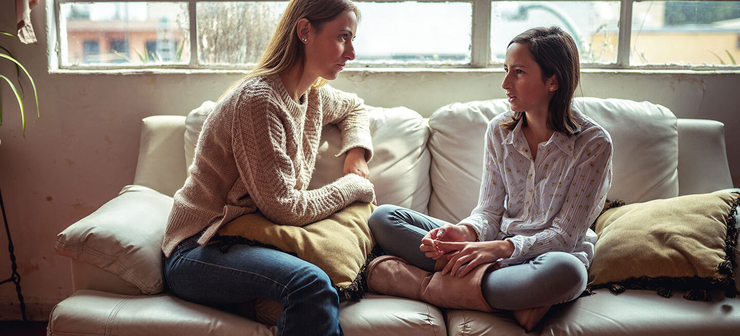 Woman and Teen Talking