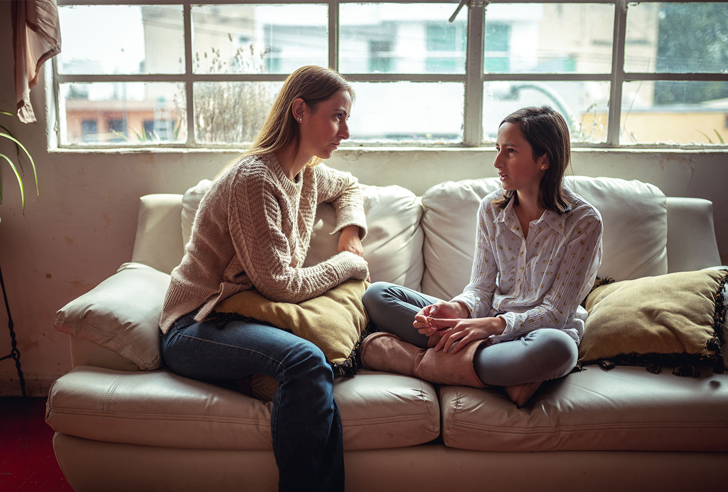 Woman and Teen Talking